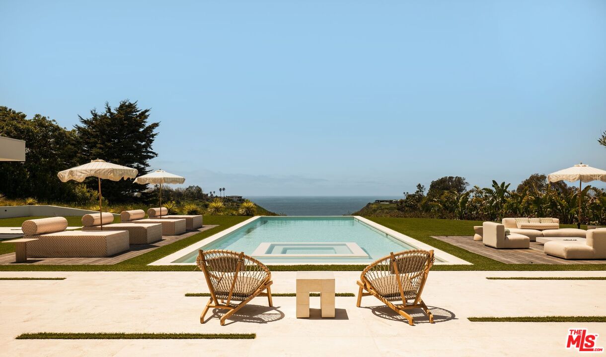 6889 Dume Drive Malibu, CA 90265 - Photo 1 of 41 a picture of a room with gym equipment