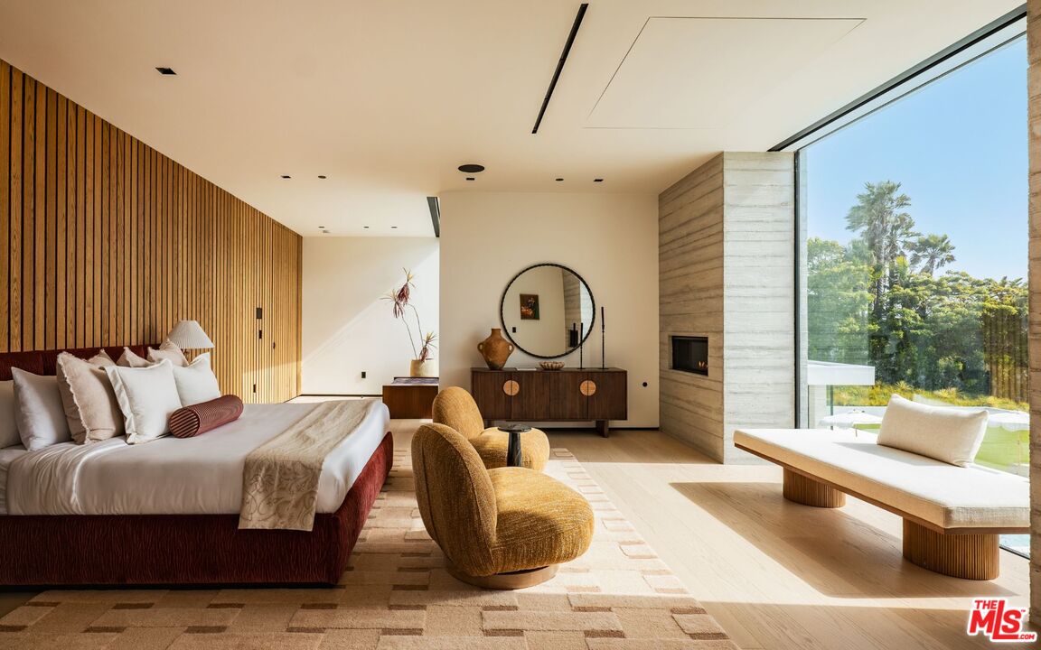 6889 Dume Drive Malibu, CA 90265 - Photo 16 of 41 a living room with furniture