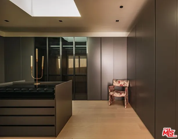 a bathroom with a shower and a sink