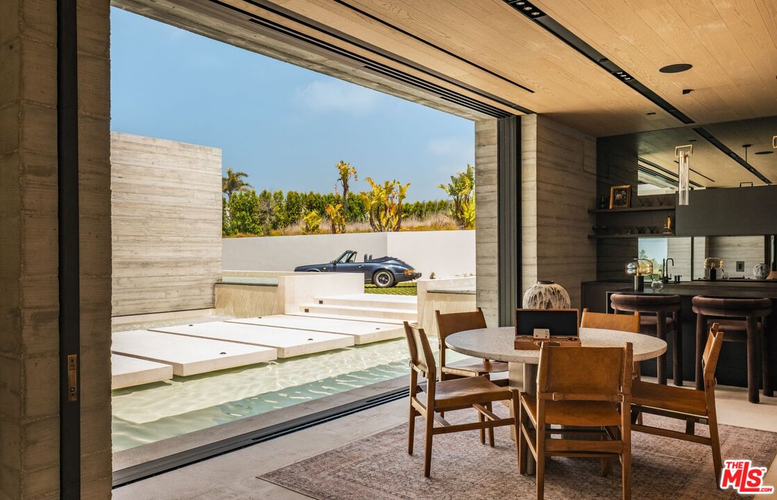 6889 Dume Drive Malibu, CA 90265 - Photo 27 of 41 a view of a outdoor seating area