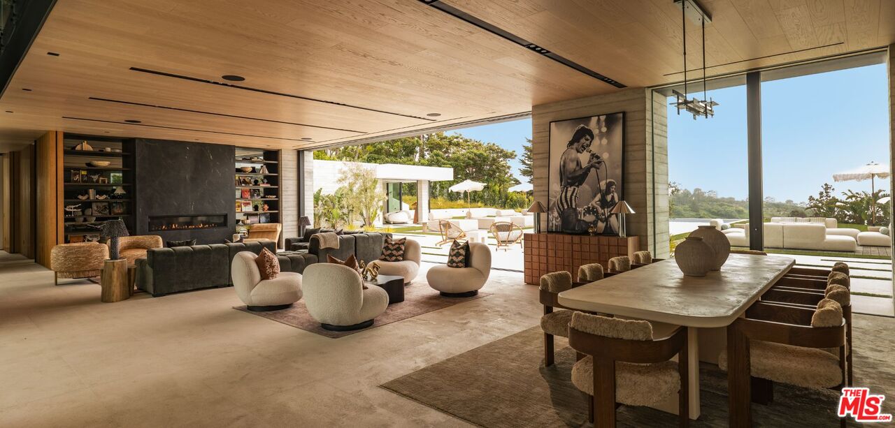 6889 Dume Drive Malibu, CA 90265 - Photo 6 of 41 a living room with furniture and a window