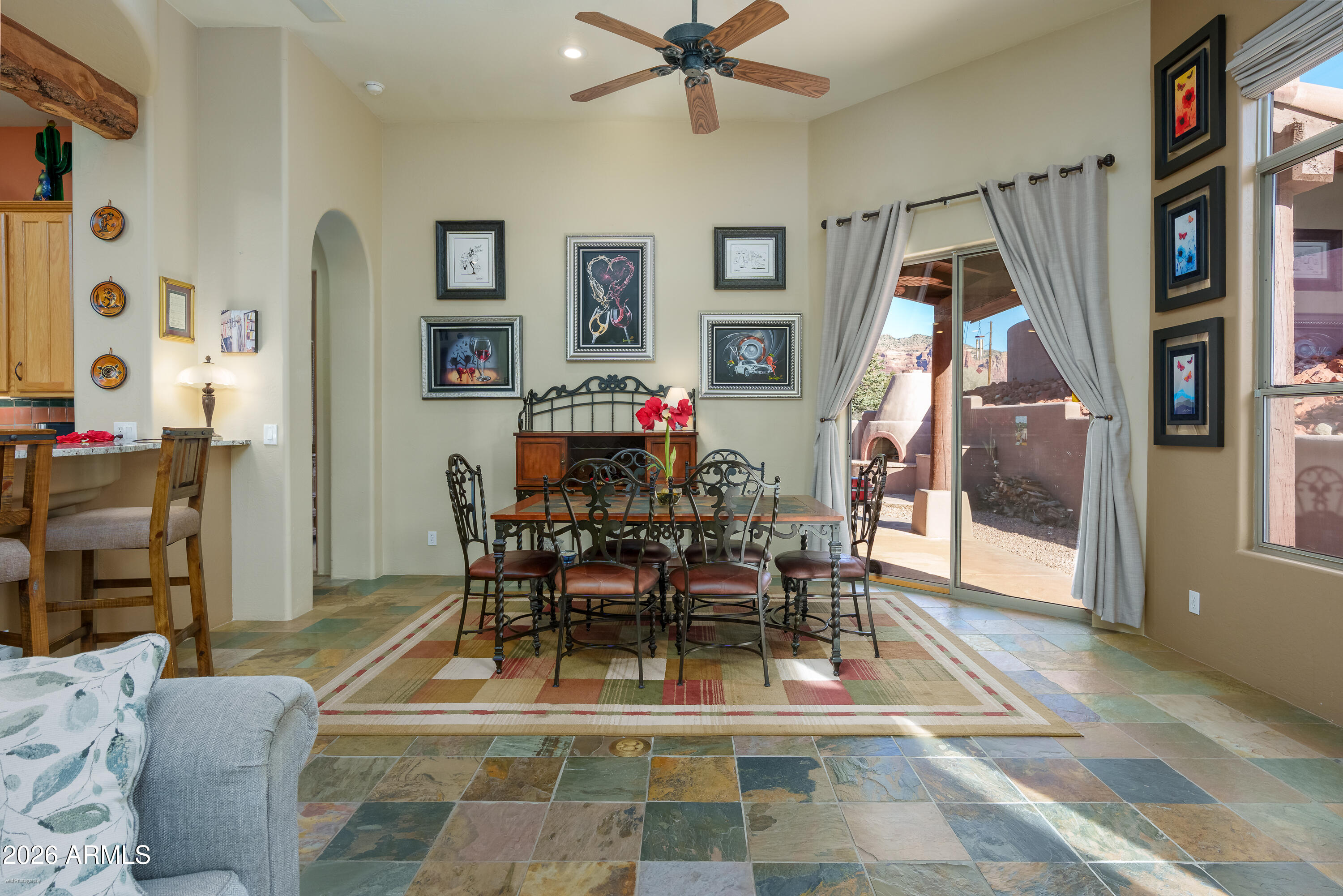 100 Rio Sinagua Sedona, AZ 86351 - Photo 14 of 43 a living room with furniture and a dining table with wooden floor