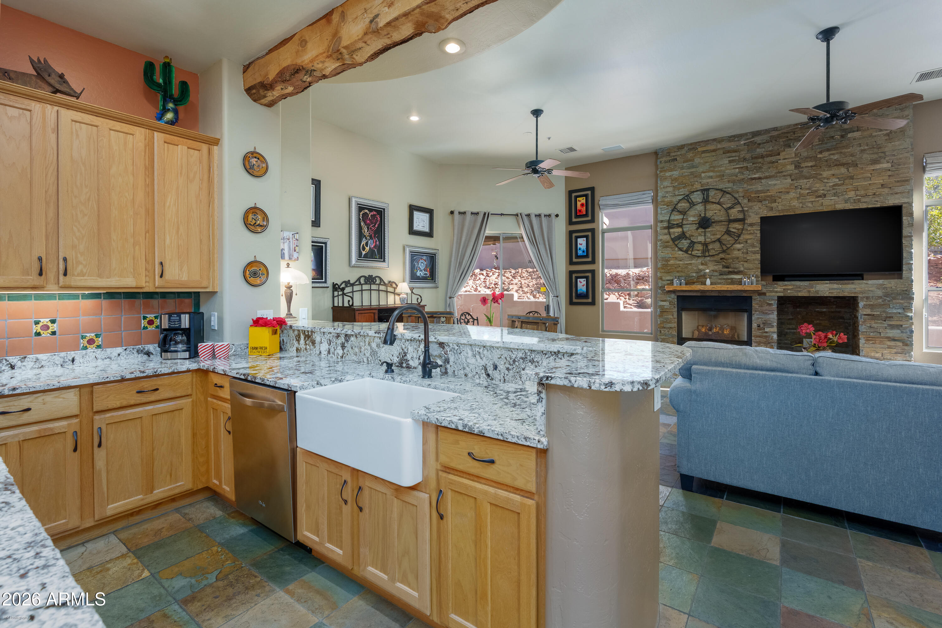 100 Rio Sinagua Sedona, AZ 86351 - Photo 15 of 43 a kitchen with stainless steel appliances granite countertop a sink and a counter space