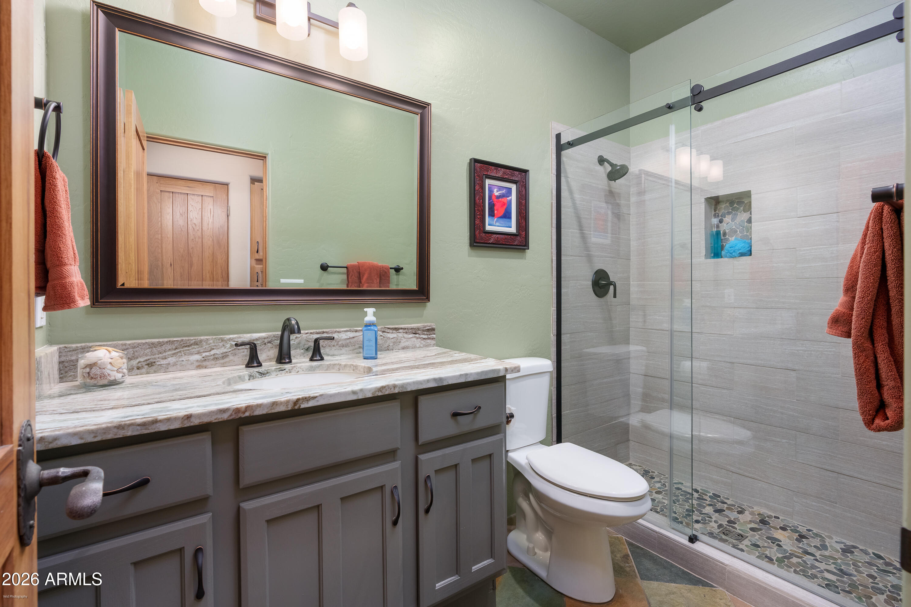 100 Rio Sinagua Sedona, AZ 86351 - Photo 28 of 43 a bathroom with a sink a toilet and shower