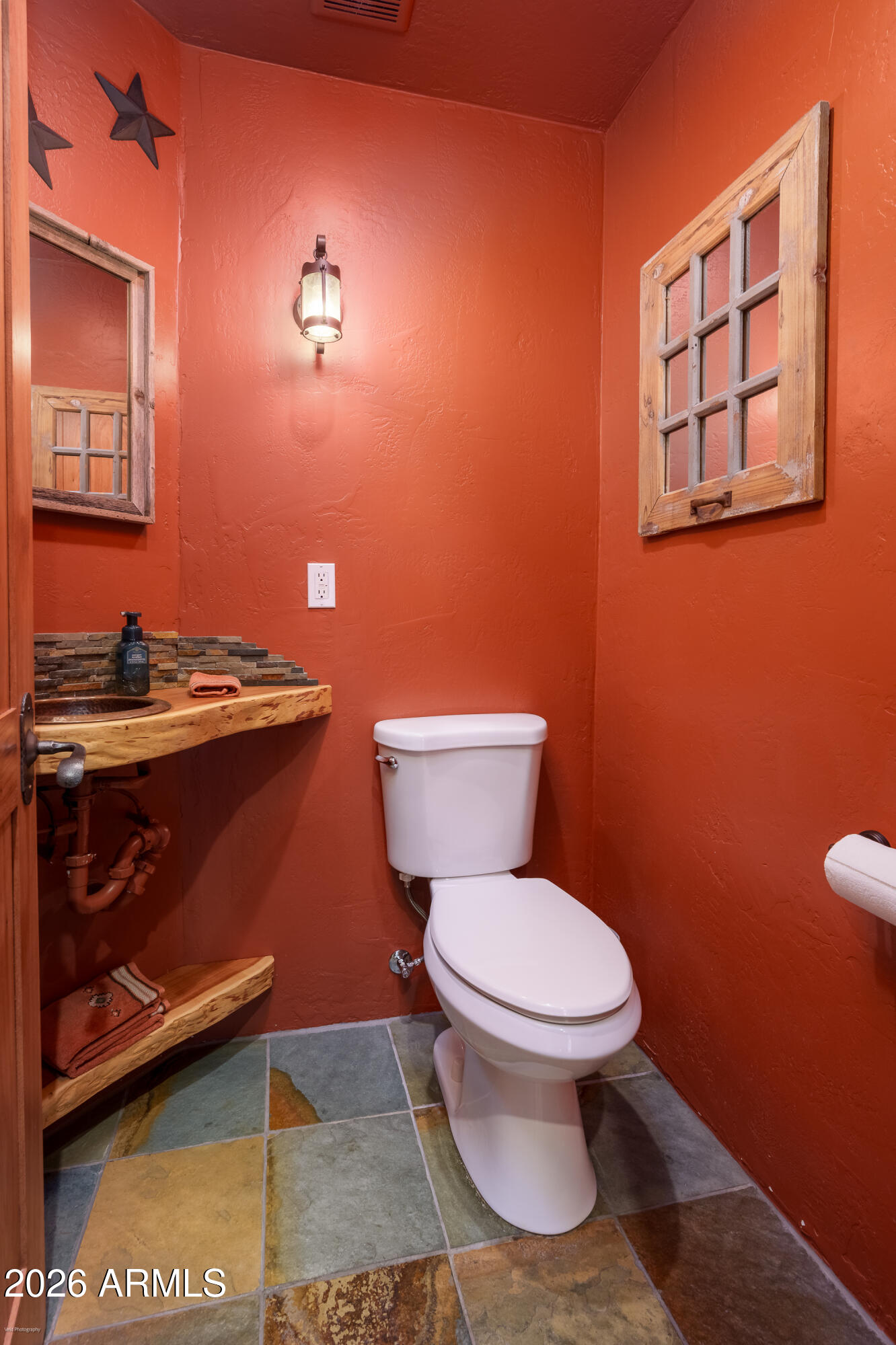 100 Rio Sinagua Sedona, AZ 86351 - Photo 30 of 43 a bathroom with a toilet and a sink