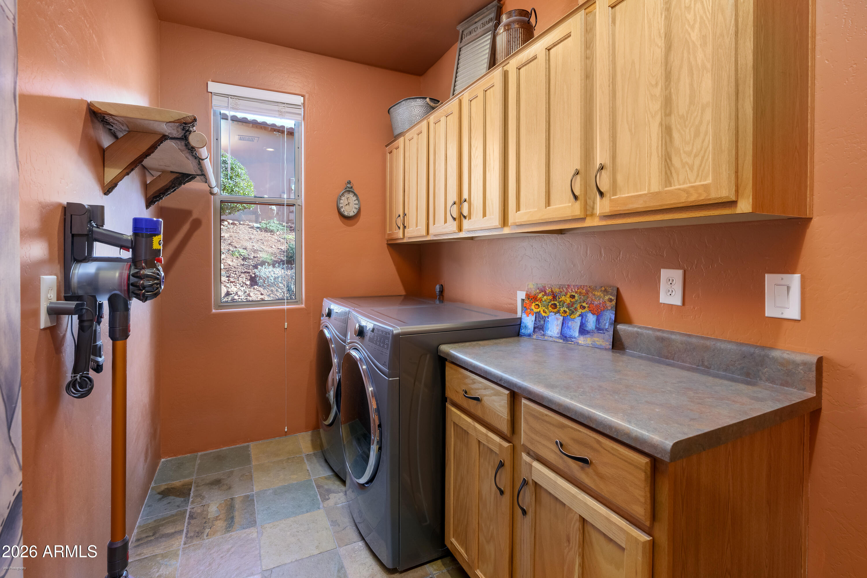 100 Rio Sinagua Sedona, AZ 86351 - Photo 32 of 43 a utility room with dryer and washer