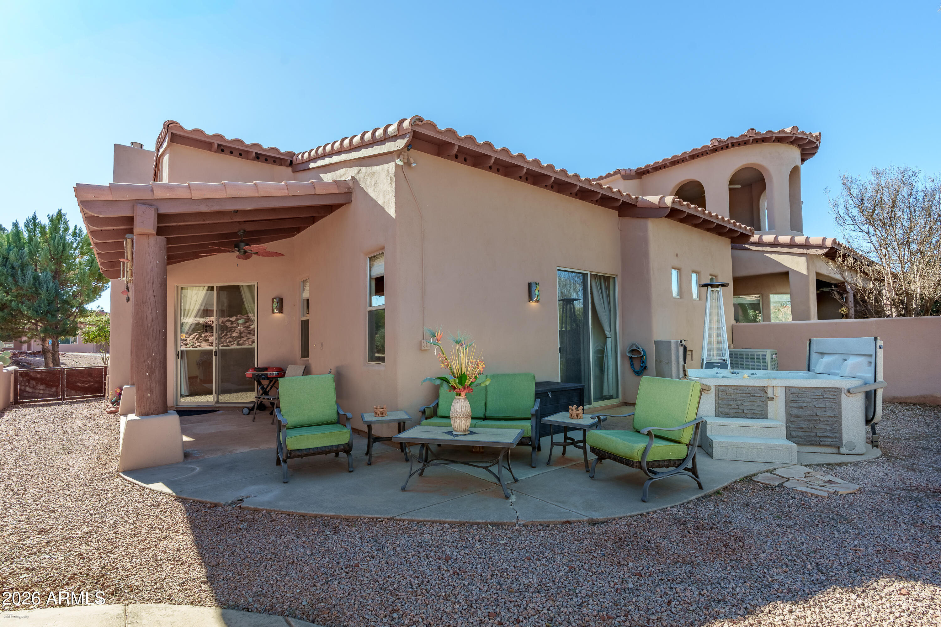 100 Rio Sinagua Sedona, AZ 86351 - Photo 37 of 43 a view of a house with backyard and sitting area