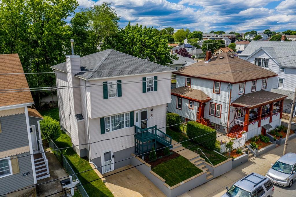 1461 Rodman Street Fall River, MA 02721 - Photo 1 of 40 a aerial view of a house with swimming pool garden and patio