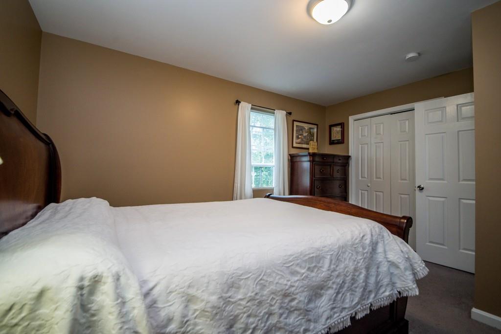 1461 Rodman Street Fall River, MA 02721 - Photo 29 of 40 a bedroom with a bed and a dresser