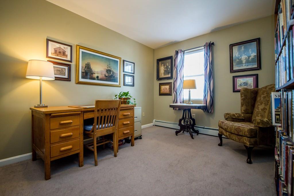 1461 Rodman Street Fall River, MA 02721 - Photo 31 of 40 a bedroom with bed and a window
