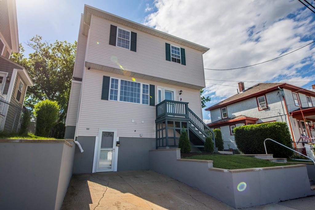 1461 Rodman Street Fall River, MA 02721 - Photo 5 of 40 a view of building with outdoor space