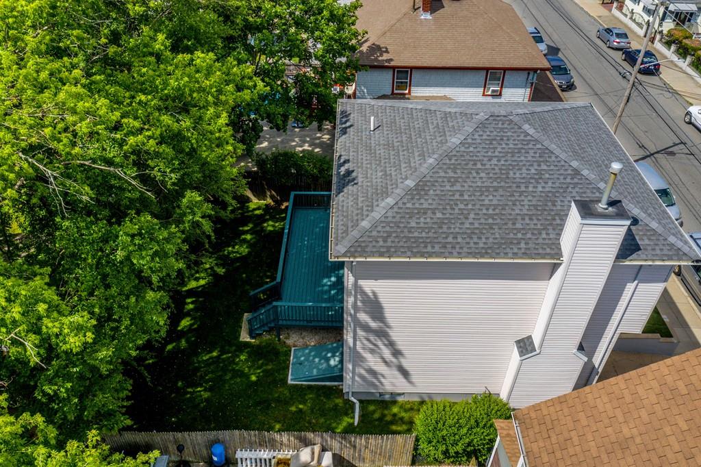 1461 Rodman Street Fall River, MA 02721 - Photo 7 of 40 front view of a house with a garden