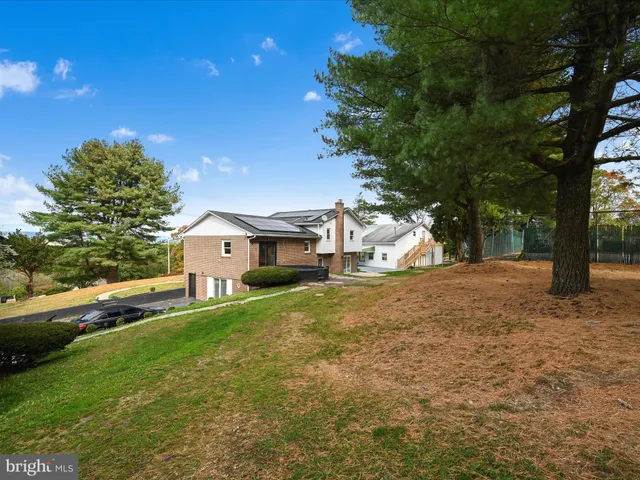 a fire hydrant in the middle of a field