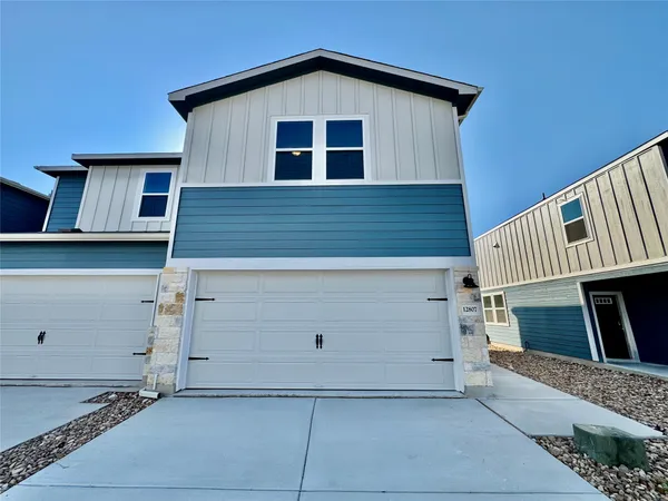 a view of a house with garage
