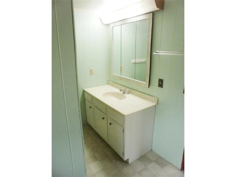 198 Mahle Road Clarksville, PA 15322 - Photo 14 of 22 Full Bath. Large Vanity area with great triple mirror built in cabinet!