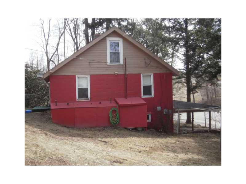 198 Mahle Road Clarksville, PA 15322 - Photo 19 of 22 Yard/Garden. Side view of the home.