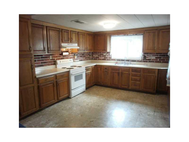 198 Mahle Road Clarksville, PA 15322 - Photo 3 of 22 Kitchen. Light Bright and Cheerful Kitchen with updated oak cabinetry, electric stove included. Ready for your decorating touches.