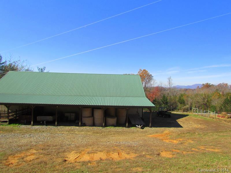 7858 Cheatham Ford Road Hiddenite, NC 28636 - Photo 24 of 24 a front view of a house with a yard
