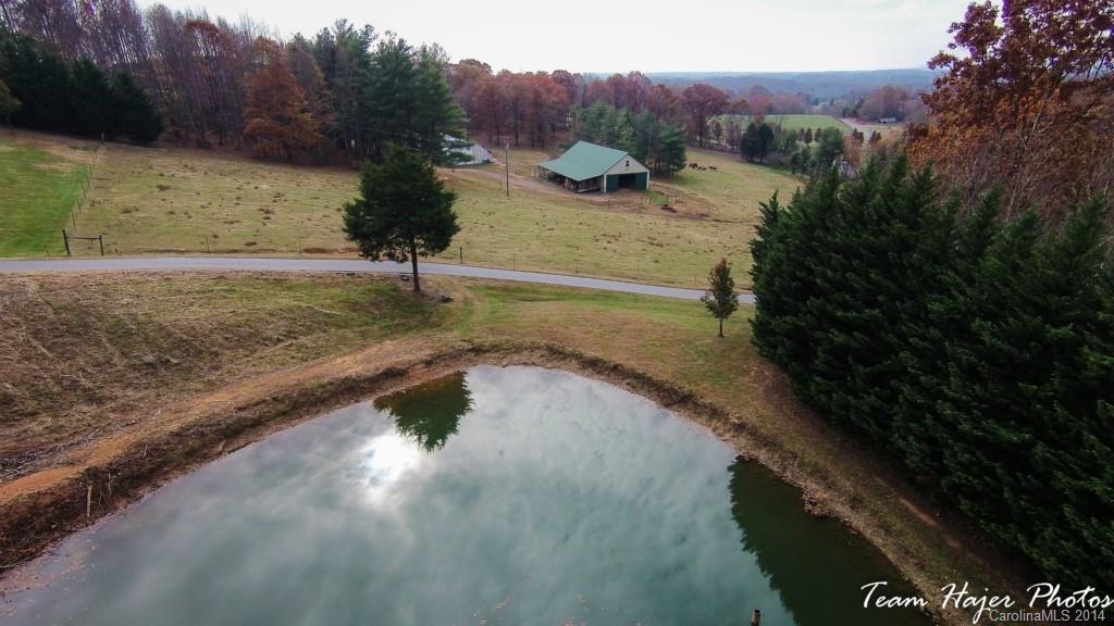 7858 Cheatham Ford Road Hiddenite, NC 28636 - Photo 5 of 24 a view of a water fountain in a yard