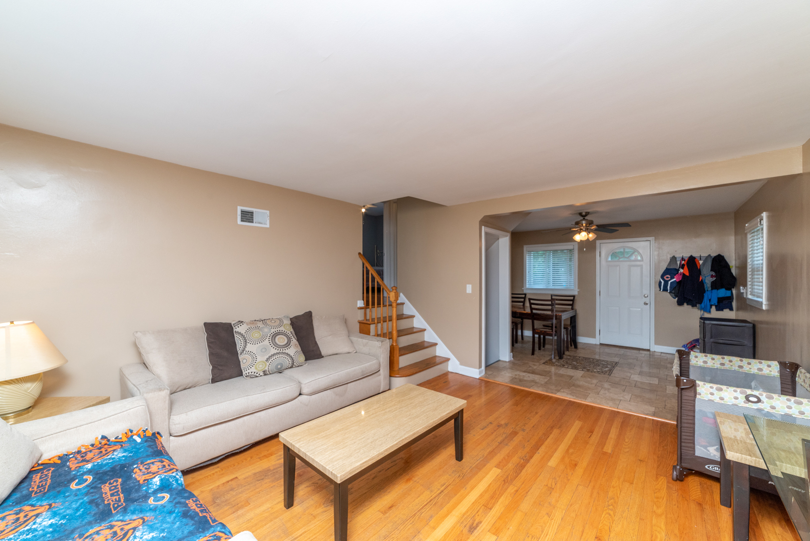 1528 Morris Avenue Berkeley, IL 60163 - Photo 5 of 25 a living room with furniture and a wooden floor