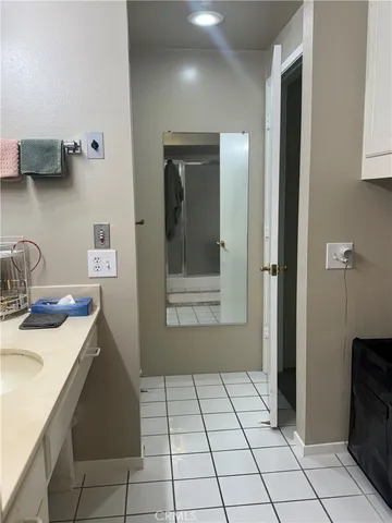 a kitchen with stainless steel appliances a sink and cabinets