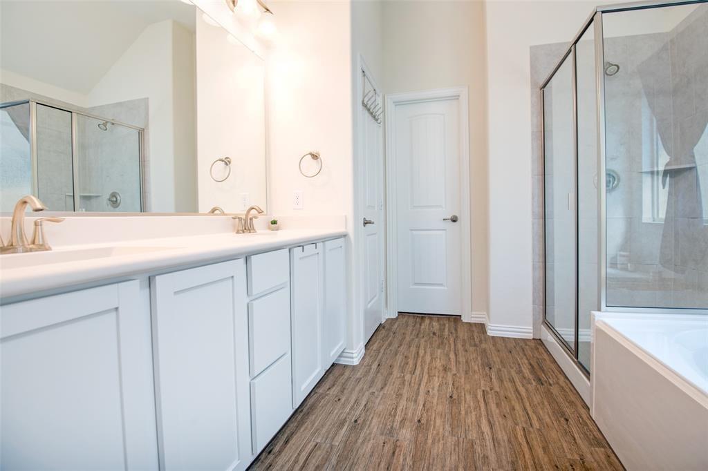 14845 Gilley Lane Fort Worth, TX 76052 - Photo 16 of 35 a bathroom with a sink and a mirror