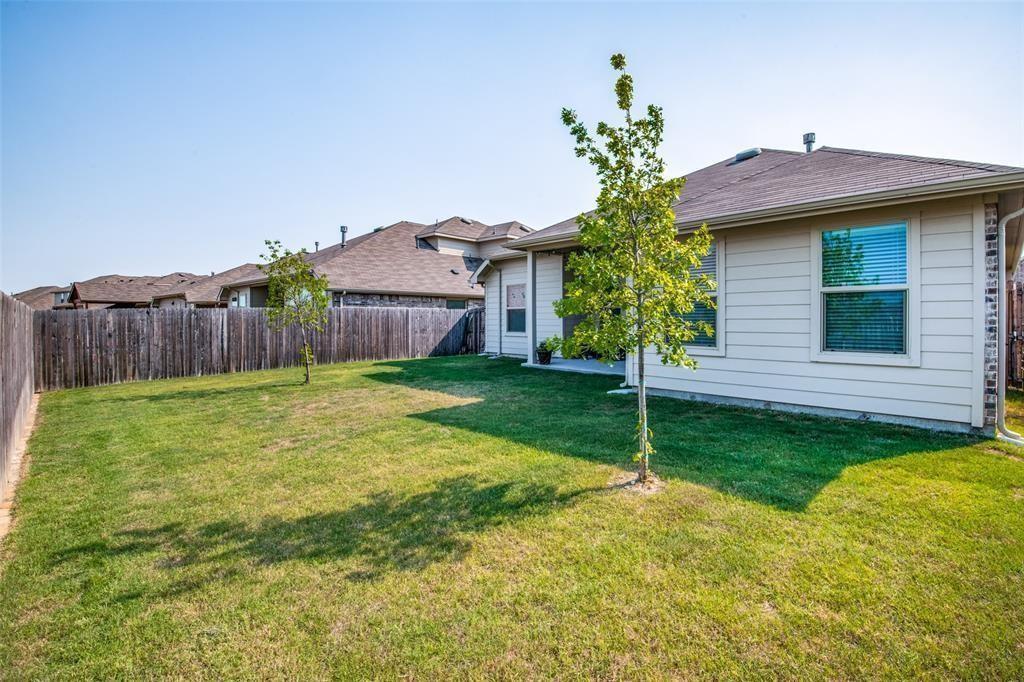 14845 Gilley Lane Fort Worth, TX 76052 - Photo 2 of 35 a house view with a garden space