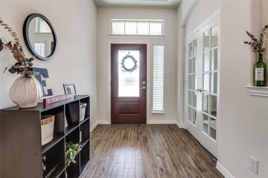 14845 Gilley Lane Fort Worth, TX 76052 - Photo 33 of 35 a view of a hallway to a livingroom with furniture