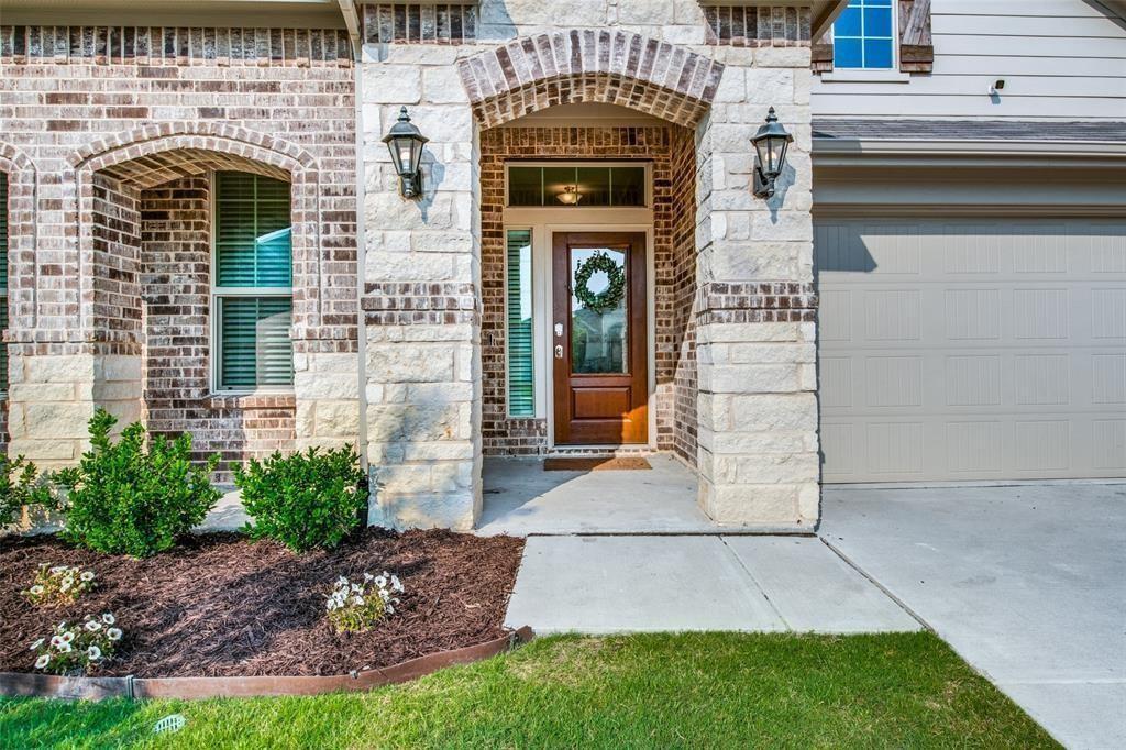 14845 Gilley Lane Fort Worth, TX 76052 - Photo 34 of 35 a front view of a house with garden