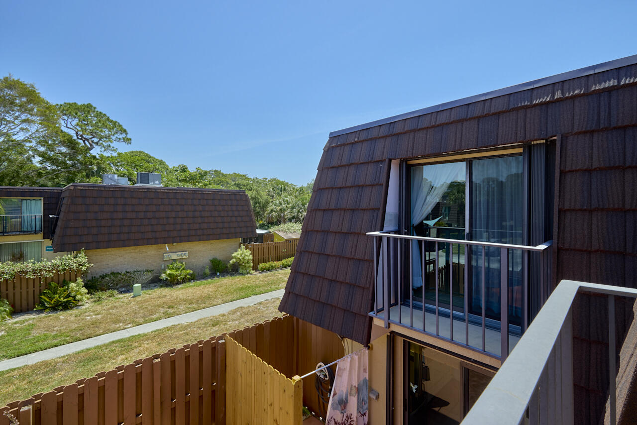 6025 Southeast Riverboat Drive, Unit 811 Stuart, FL 34997 - Photo 26 of 37 a view of deck with patio