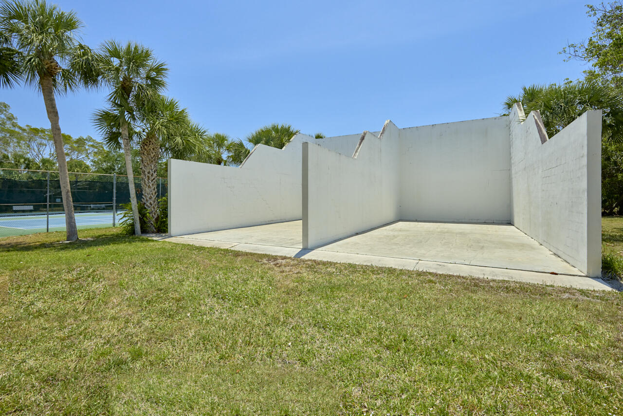 6025 Southeast Riverboat Drive, Unit 811 Stuart, FL 34997 - Photo 36 of 37 a view of a backyard