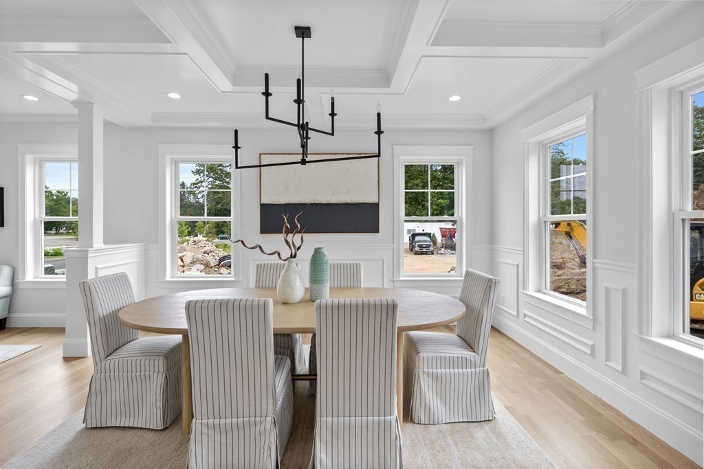 6 Rowell Road Middleton, MA 01949 - Photo 11 of 35 a view of a dining room with furniture window and wooden floor