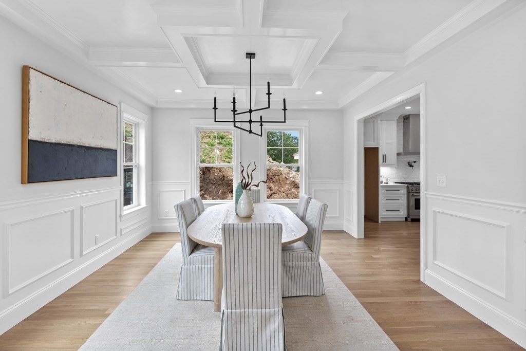 6 Rowell Road Middleton, MA 01949 - Photo 12 of 35 a view of a living room and kitchen floor