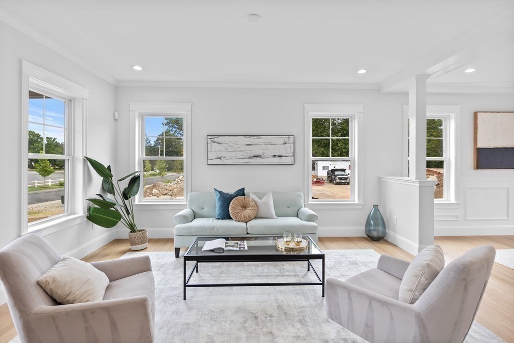 6 Rowell Road Middleton, MA 01949 - Photo 13 of 35 a living room with furniture and a large window