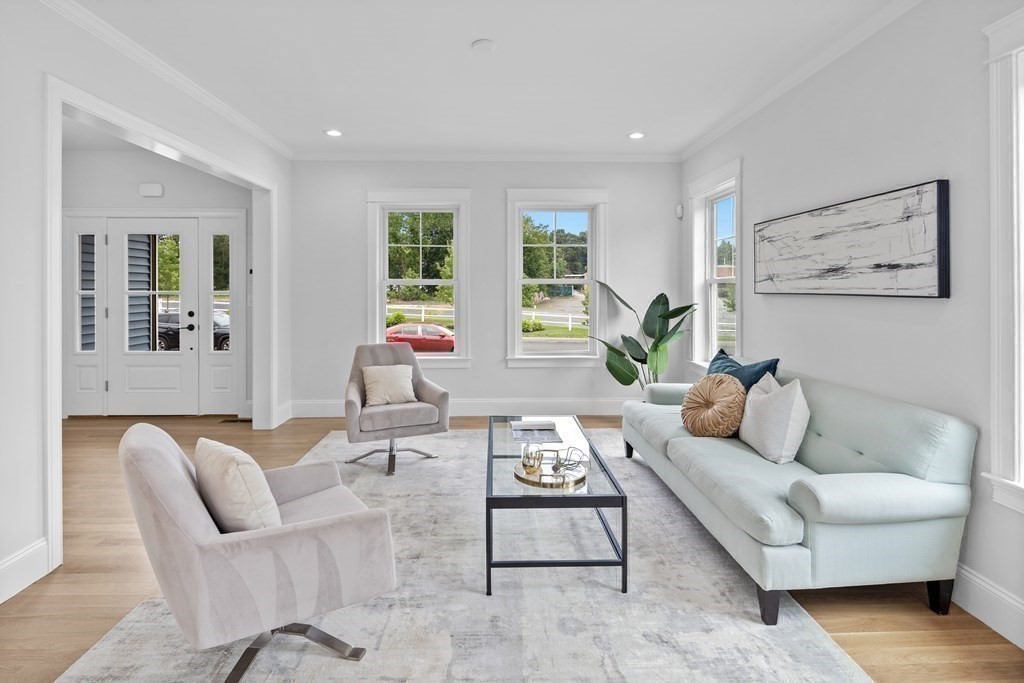 6 Rowell Road Middleton, MA 01949 - Photo 14 of 35 a living room with furniture and large windows