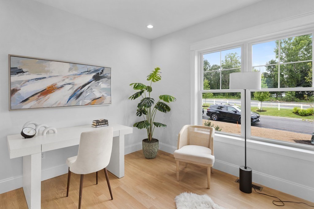 6 Rowell Road Middleton, MA 01949 - Photo 18 of 35 a living room with furniture and a potted plant