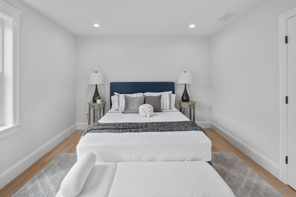 6 Rowell Road Middleton, MA 01949 - Photo 29 of 35 a bedroom with a bed and a window