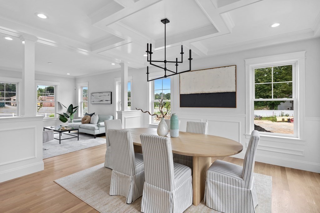 6 Rowell Road Middleton, MA 01949 - Photo 10 of 35 a view of a dining room with furniture window and wooden floor
