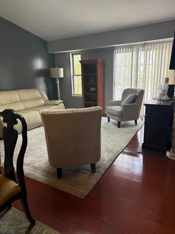 a living room with furniture and window