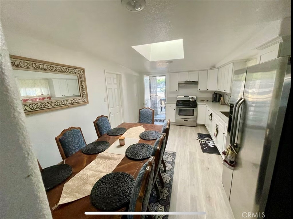 10945-10953 Campbell Avenue Riverside, CA 92505 - Photo 3 of 34 a living room with furniture and a fireplace