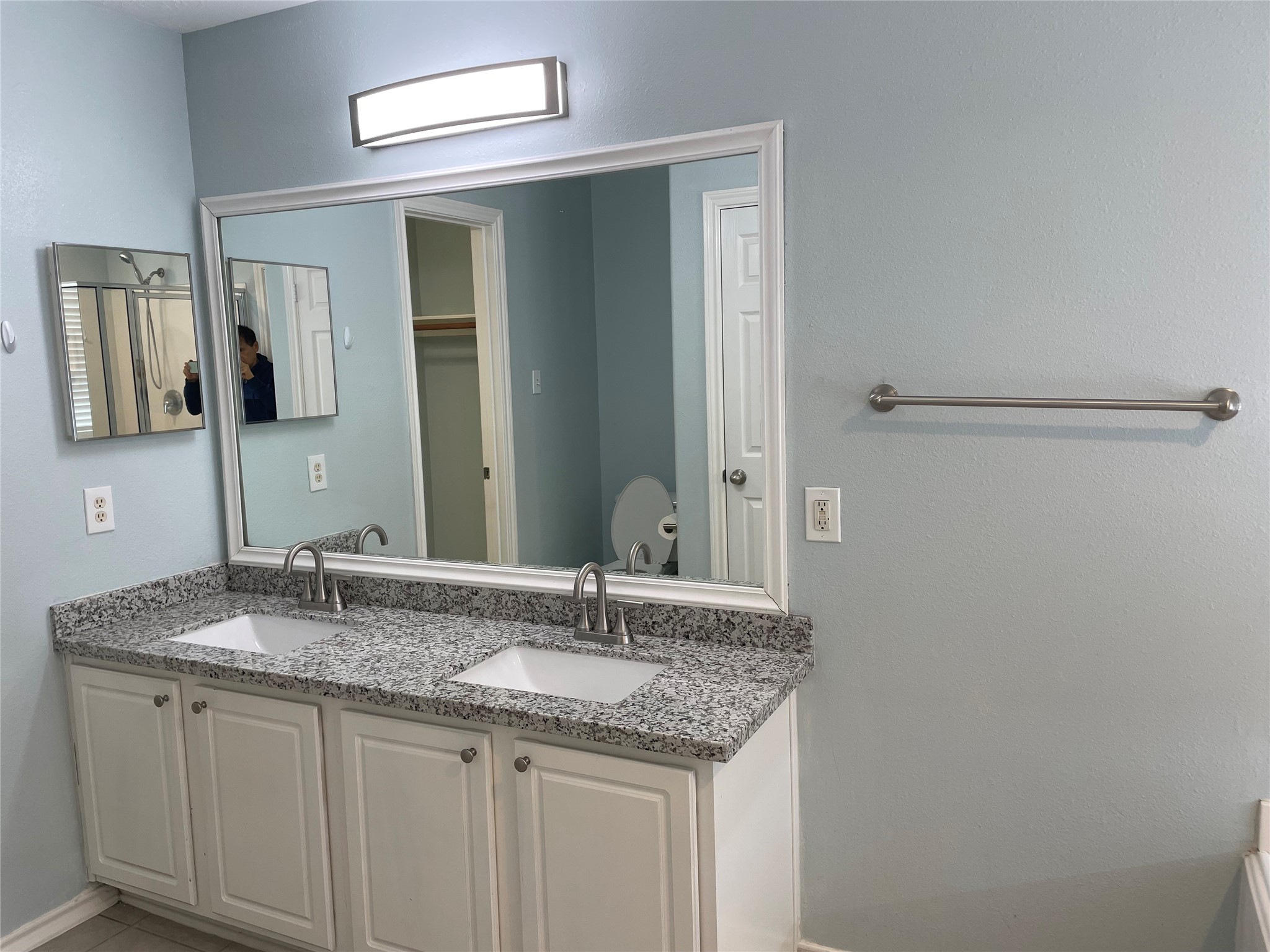 9022 Elm Drake Lane Humble, TX 77338 - Photo 12 of 17 a bathroom with a granite countertop sink and a mirror