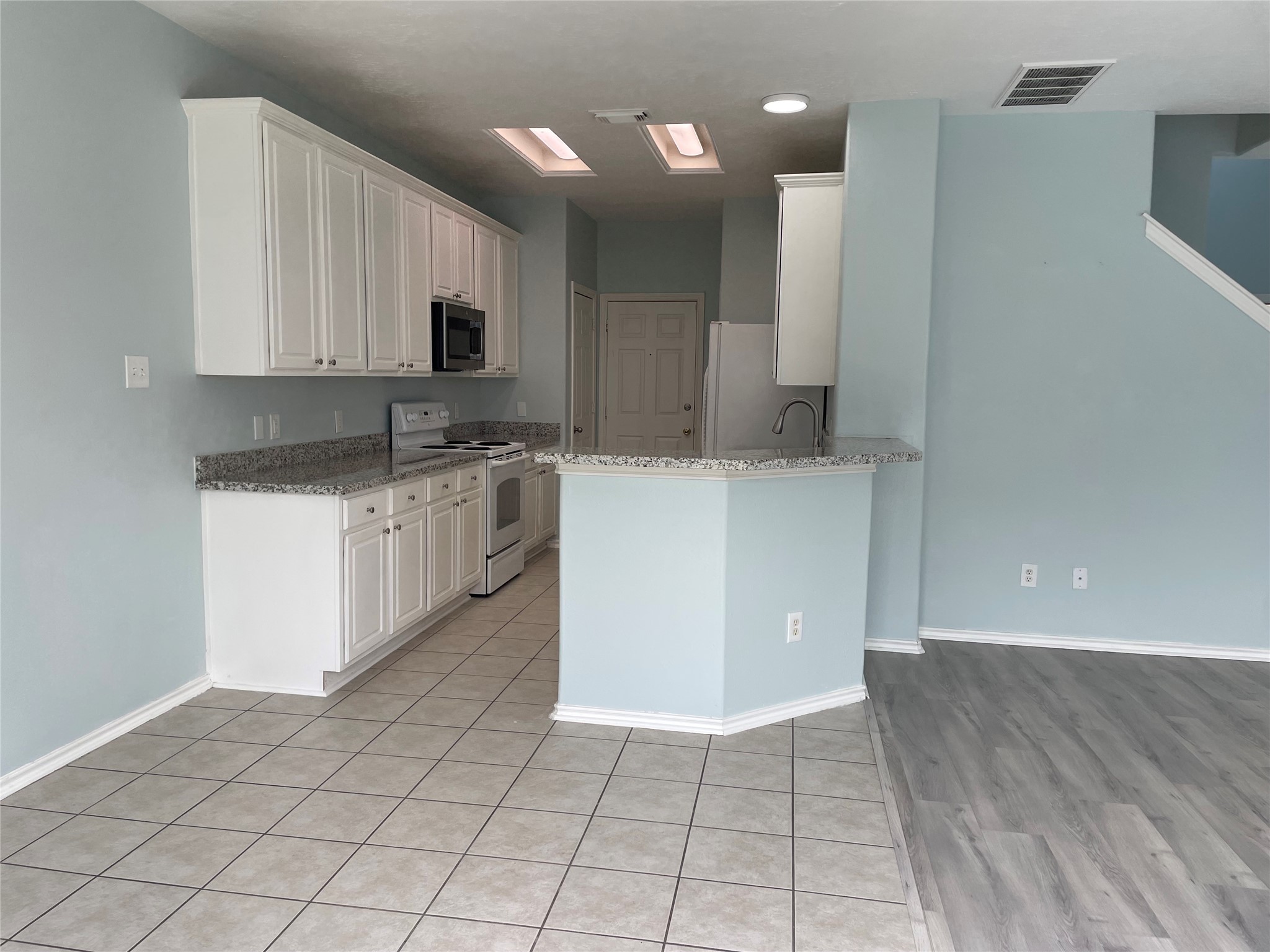9022 Elm Drake Lane Humble, TX 77338 - Photo 5 of 17 a kitchen with stainless steel appliances a sink and a stove top oven