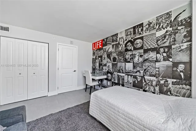 a view of a hallway with a kitchen