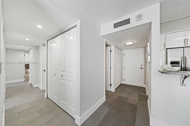 a bathroom with a sink toilet a shower and a mirror