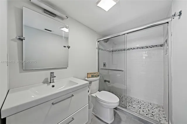 a bathroom with a bathtub and a toilet