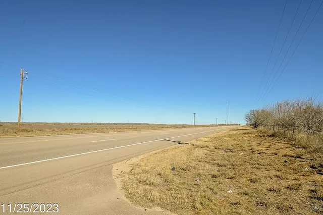a bathroom with mirror gate