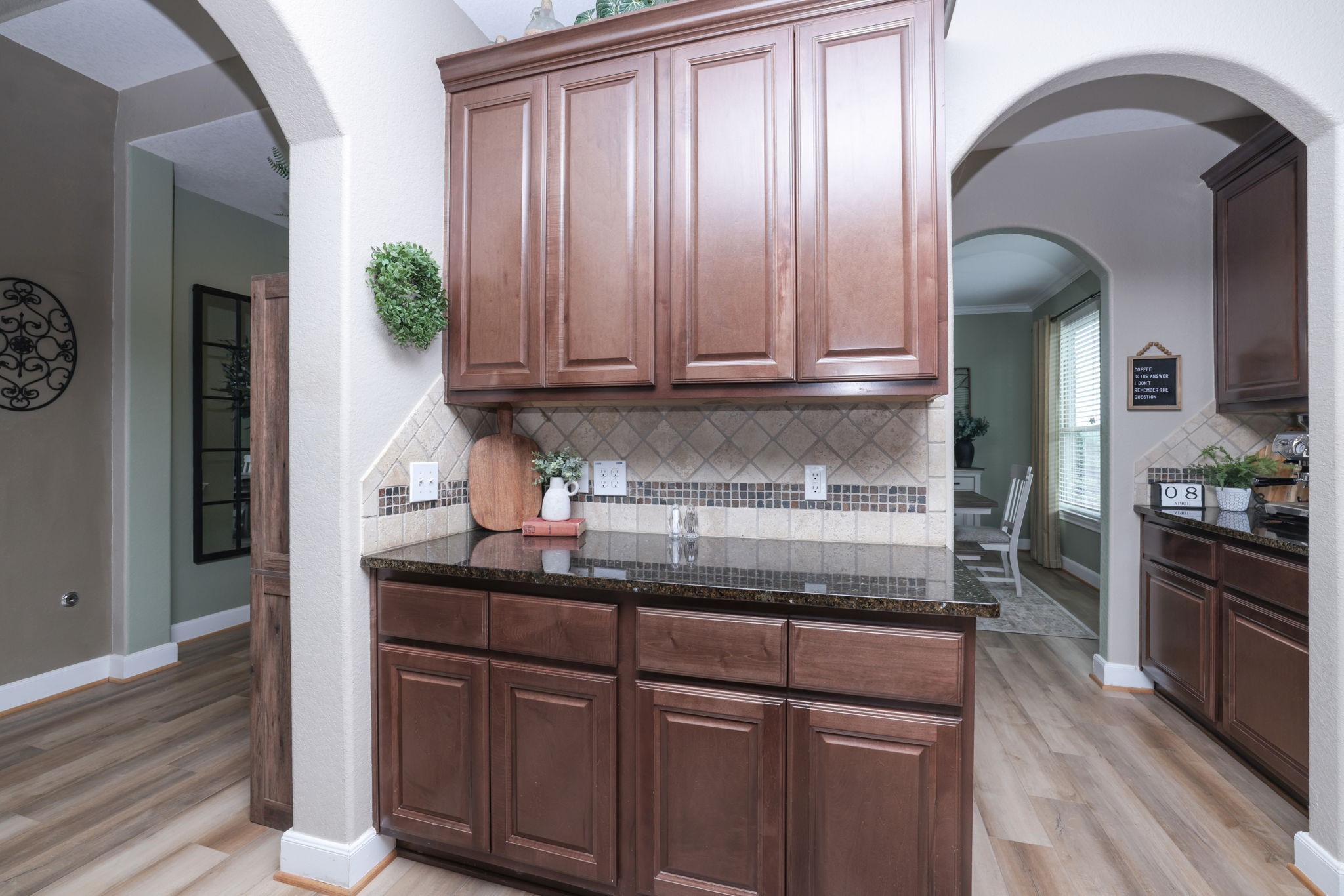 5922 Glen Lief Court Spring, TX 77379 - Photo 14 of 41 a kitchen with granite countertop a sink and a stove