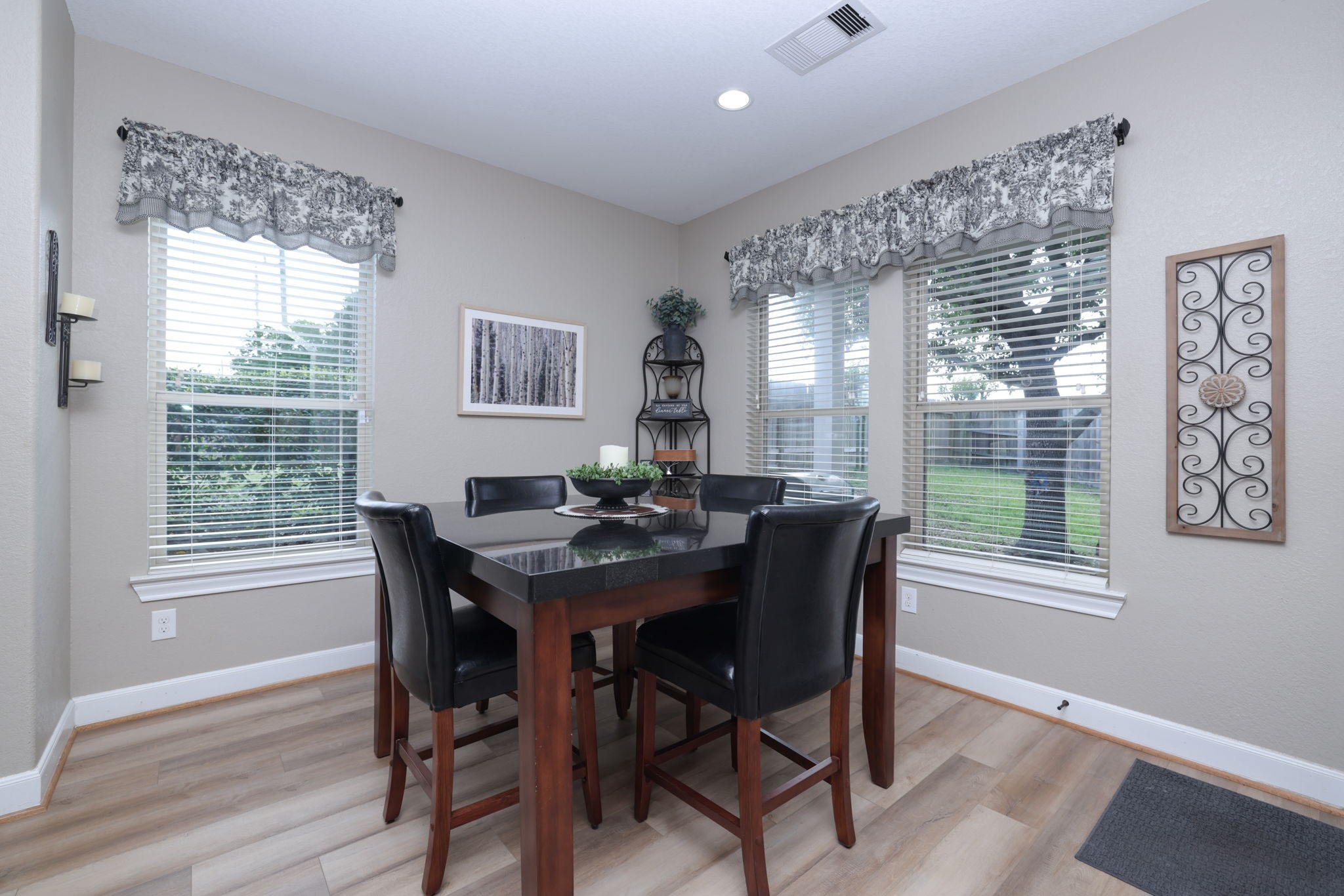 5922 Glen Lief Court Spring, TX 77379 - Photo 16 of 41 a view of a dining room with furniture window and wooden floor