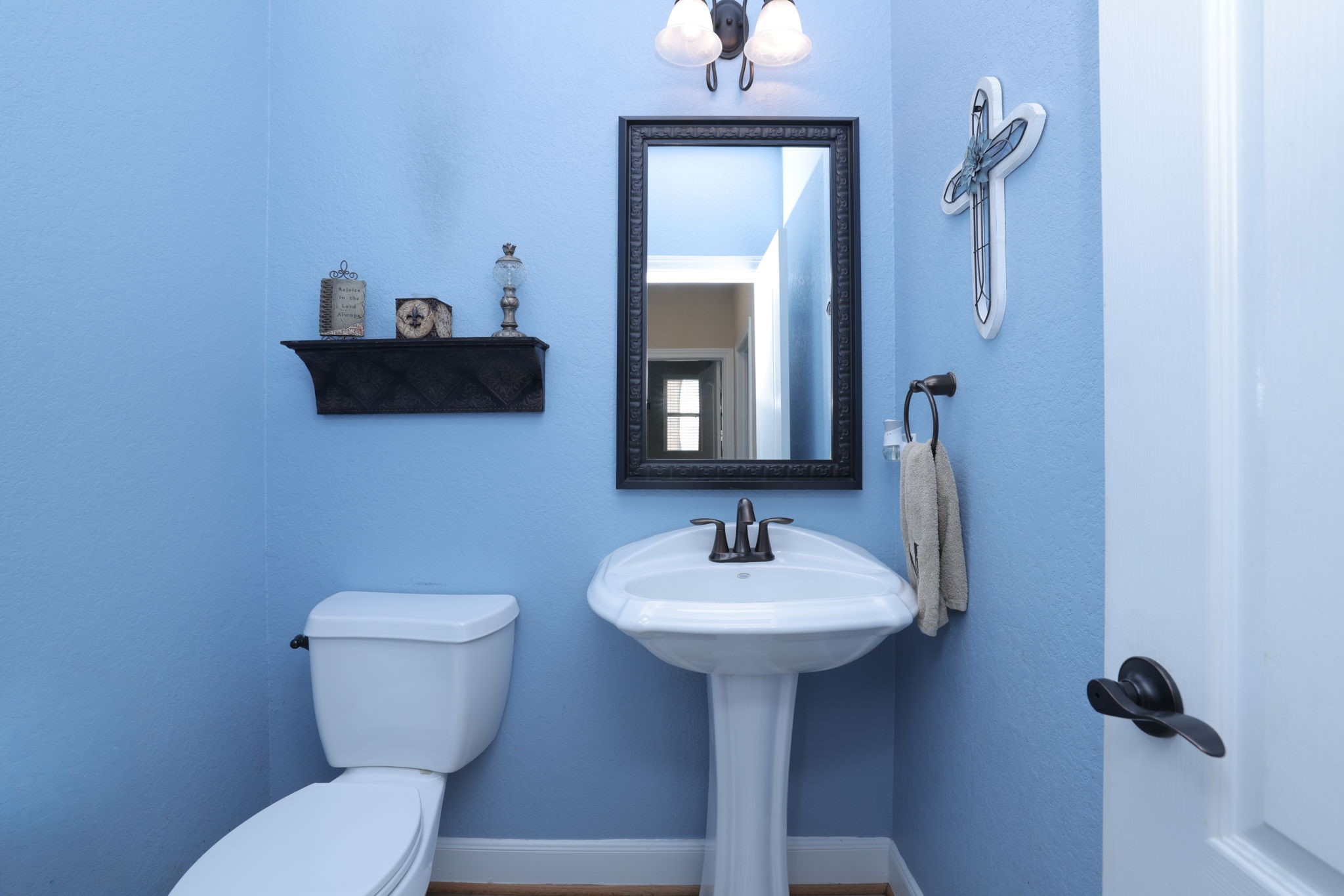 5922 Glen Lief Court Spring, TX 77379 - Photo 17 of 41 a bathroom with a sink toilet and mirror