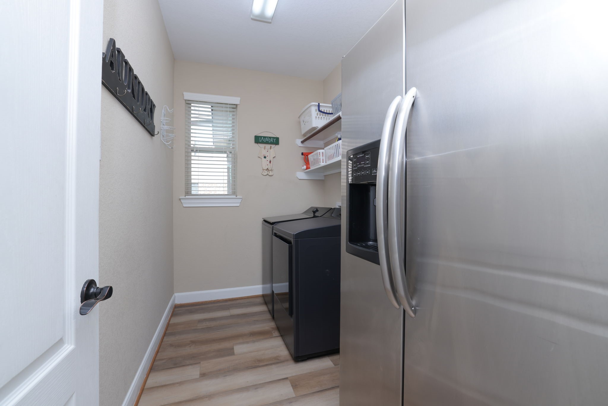 5922 Glen Lief Court Spring, TX 77379 - Photo 18 of 41 a view of entryway and hall with wooden floor